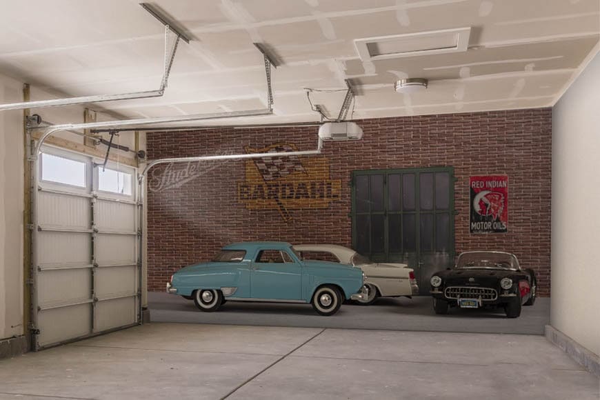 Pared de garaje con una escena simulada con coches americanos en un espacio vintage